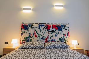 A bed or beds in a room at La casa di Archimede