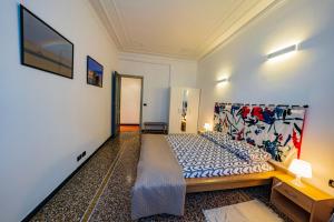 A bed or beds in a room at La casa di Archimede