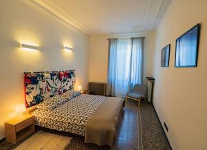 A bed or beds in a room at La casa di Archimede