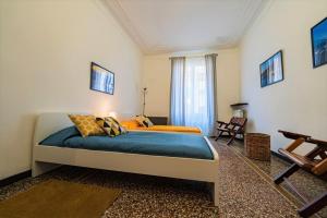 A bed or beds in a room at La casa di Archimede