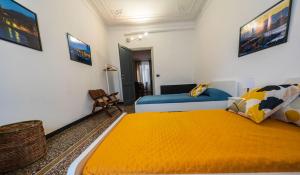 A bed or beds in a room at La casa di Archimede