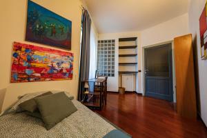 A bed or beds in a room at La casa di Archimede