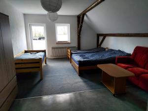 Ліжко або ліжка в номері Siedlisko Waliszówka