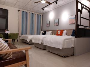 Postel nebo postele na pokoji v ubytování Lubi Inn