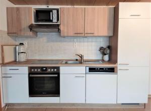 Kuchyň nebo kuchyňský kout v ubytování Ferienwohnung-Nickl