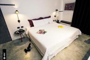 Katil atau katil-katil dalam bilik di BTH Hotel – Boutique Concept