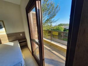 Postel nebo postele na pokoji v ubytování Hotel Pousada Capão