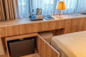 Postel nebo postele na pokoji v ubytování HOTEL AGAPE