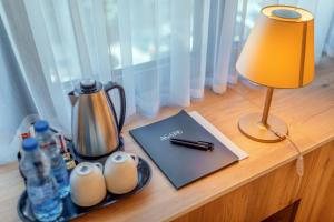 Příslušenství pro přípravu čaje a kávy v ubytování HOTEL AGAPE