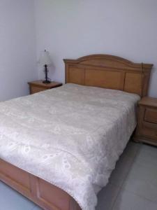 Кровать или кровати в номере Apto inteiro Seguro e Confortável com piscina