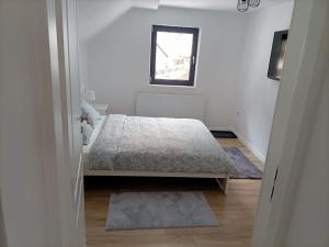Łóżko lub łóżka w pokoju w obiekcie Center House