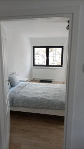 Łóżko lub łóżka w pokoju w obiekcie Center House