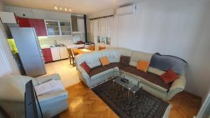 Kuchyň nebo kuchyňský kout v ubytování Villa Wind Apartments