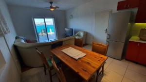 Kuchyň nebo kuchyňský kout v ubytování Villa Wind Apartments