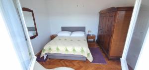 Postel nebo postele na pokoji v ubytování Villa Wind Apartments