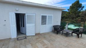 Balkón nebo terasa v ubytování Villa Wind Apartments