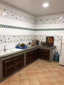 Virtuvė arba virtuvėlė apgyvendinimo įstaigoje Villa Ory