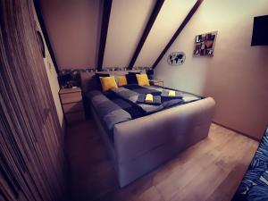 A bed or beds in a room at Panorama Home