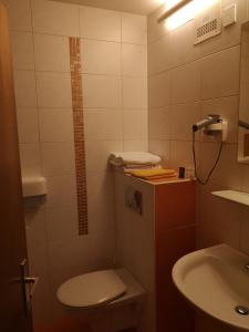 Koupelna v ubytování Hotel Wirt Z'Minsta