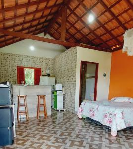 Kuchyň nebo kuchyňský kout v ubytování Chalé Anjo Gabriel II em São Tomé das Letras