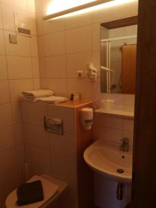 Koupelna v ubytování Hotel Wirt Z'Minsta
