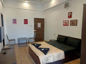 Posezení v ubytování Marigold Stay + 37 fotografií