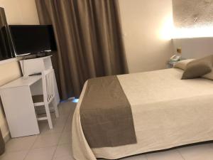Postel nebo postele na pokoji v ubytování Hotel Claramar