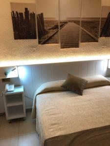Postel nebo postele na pokoji v ubytování Hotel Claramar