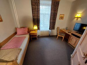 Krevet ili kreveti u jedinici u okviru objekta 3 Raben - Leoben - Zimmer für Geschäftsreisende, Urlauber, Monteure und Handwerker, Polski Pensjonat Austria