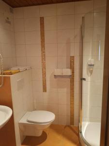 Koupelna v ubytování Hotel Wirt Z'Minsta