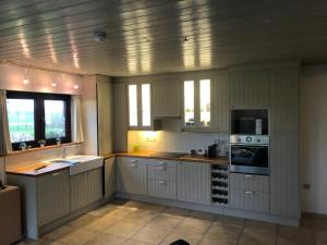 Kuchyň nebo kuchyňský kout v ubytování De Reynaarthoeve