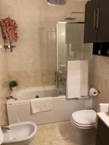 A bathroom at AGM Suite Rome Airport FCO - Attico Parco Leonardo