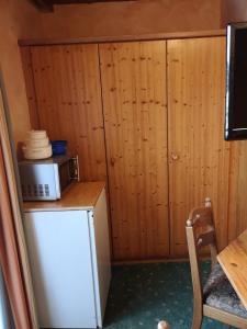 Kuchyň nebo kuchyňský kout v ubytování Hotel Wirt Z'Minsta