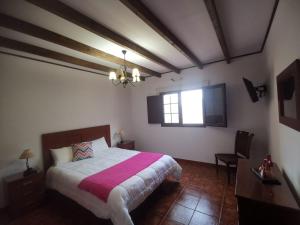 Postel nebo postele na pokoji v ubytování Casa LA JOYA + 18 fotografií