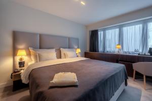 Postel nebo postele na pokoji v ubytování HOTEL AGAPE