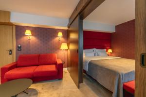 Postel nebo postele na pokoji v ubytování HOTEL AGAPE
