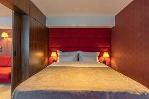 Postel nebo postele na pokoji v ubytování HOTEL AGAPE