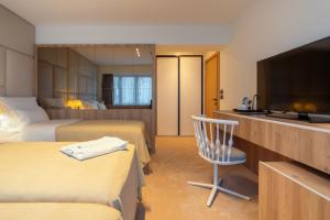 Postel nebo postele na pokoji v ubytování HOTEL AGAPE