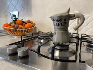 A kitchen or kitchenette at AGM Suite Rome Airport FCO - Attico Parco Leonardo