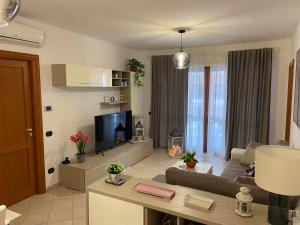 A kitchen or kitchenette at AGM Suite Rome Airport FCO - Attico Parco Leonardo