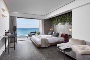Кровать или кровати в номере Dyo Suites