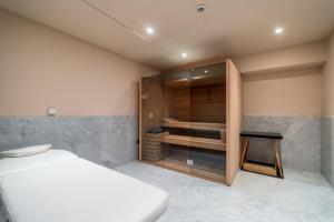 Postel nebo postele na pokoji v ubytování HOTEL AGAPE