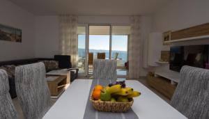 Posedenie v ubytovaní Sea view apartment Ema