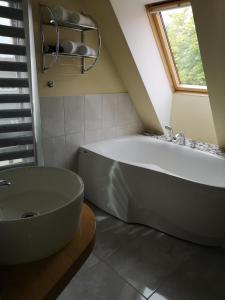 Koupelna v ubytování Hotel Senlīči
