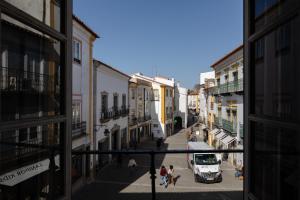 a view from a window of a city street at Casa da Avó Alsira 2 in Évora