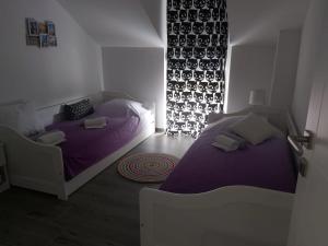Postel nebo postele na pokoji v ubytování PALMandre (Pag Apartment Luxurious)