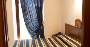 Postel nebo postele na pokoji v ubytování Hotel Residence Chateau