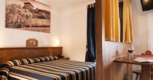 Postel nebo postele na pokoji v ubytování Hotel Residence Chateau