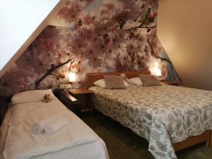 Postel nebo postele na pokoji v ubytování Hotel Senlīči