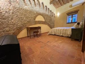 Posteľ alebo postele v izbe v ubytovaní Porta del Chianti Tuscany Apartment